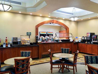 Ramada By Wyndham Olympia Hotel Restaurant photo The Club at Tampa International Airport